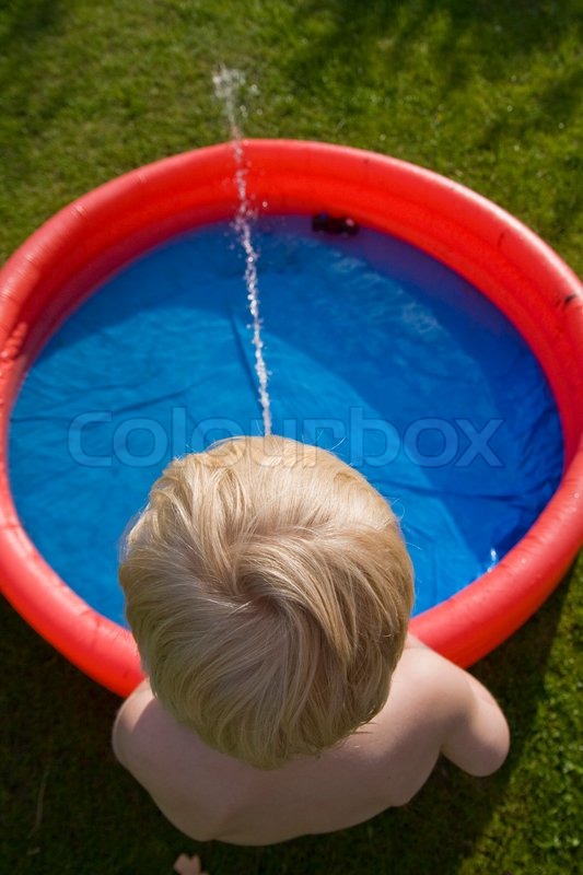 1010688-top-view-of-a-boy-playing-with-water-on-a-plastic-pool