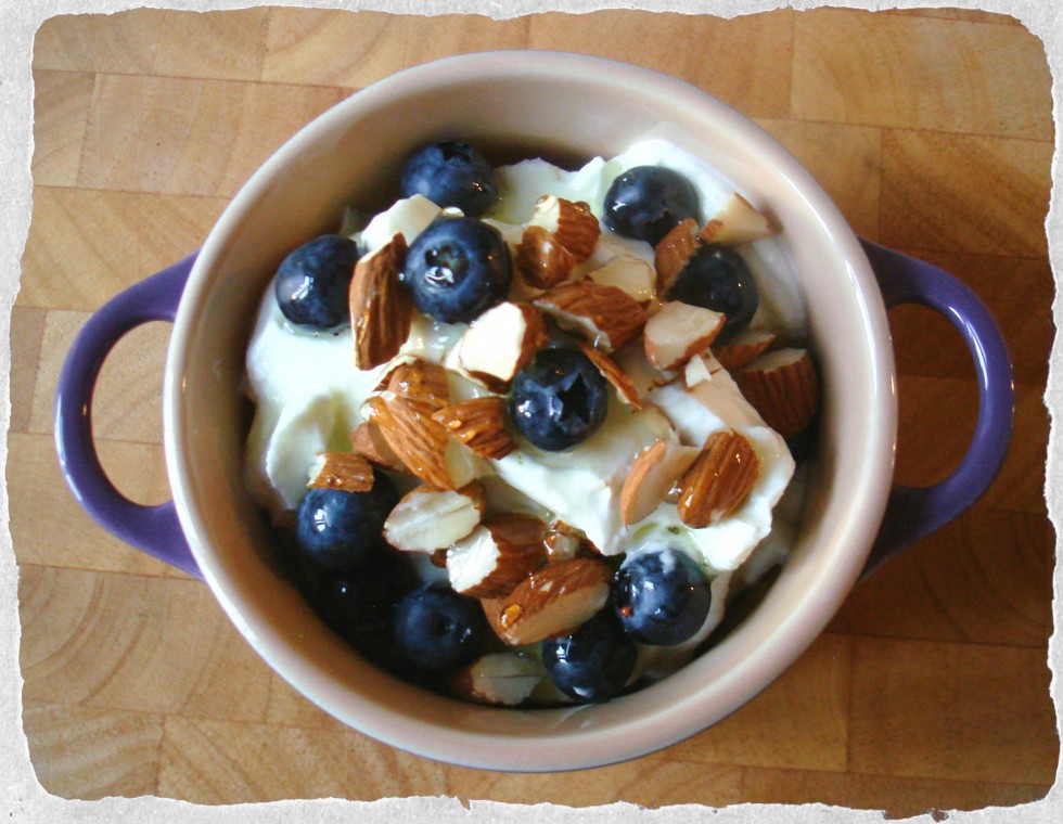 Greek yogurt with mint syrup, blueberries and almonds