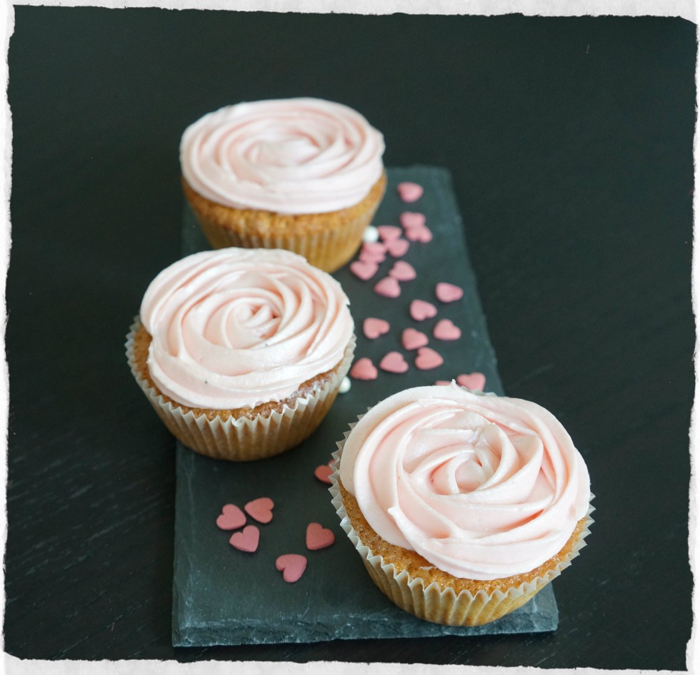 Vanilla cupcakes with raspberry frosting