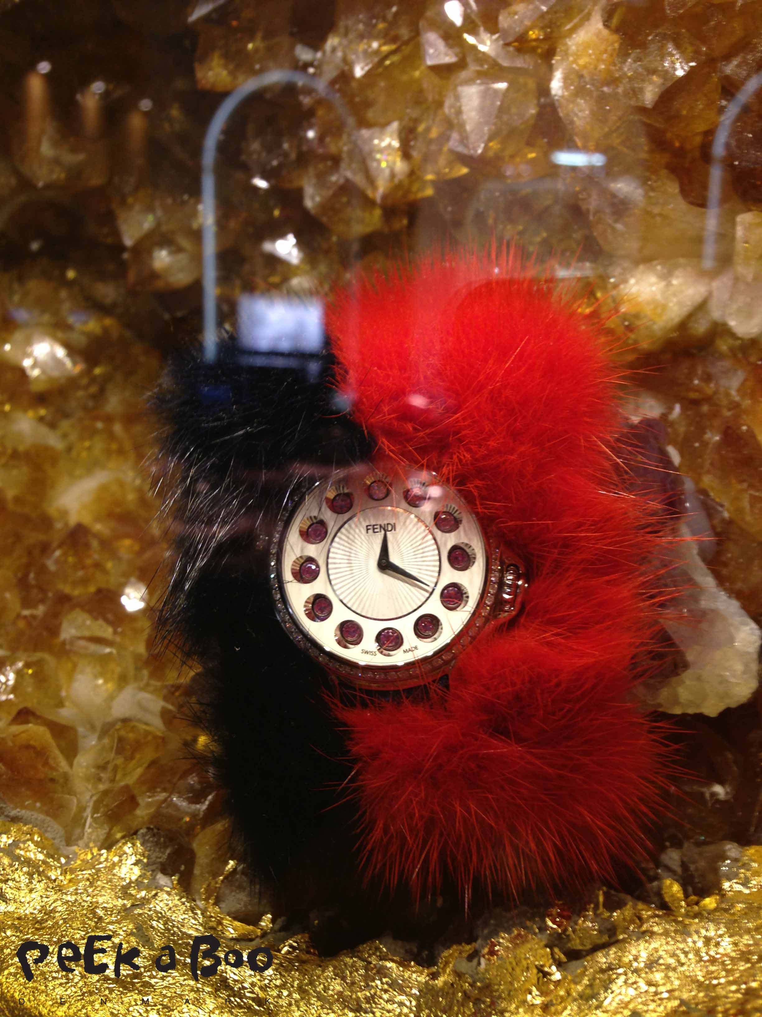 Fendi Watch with mink fur strap. AW 14 Collection presented in beautiful stone Cages built in the walls.