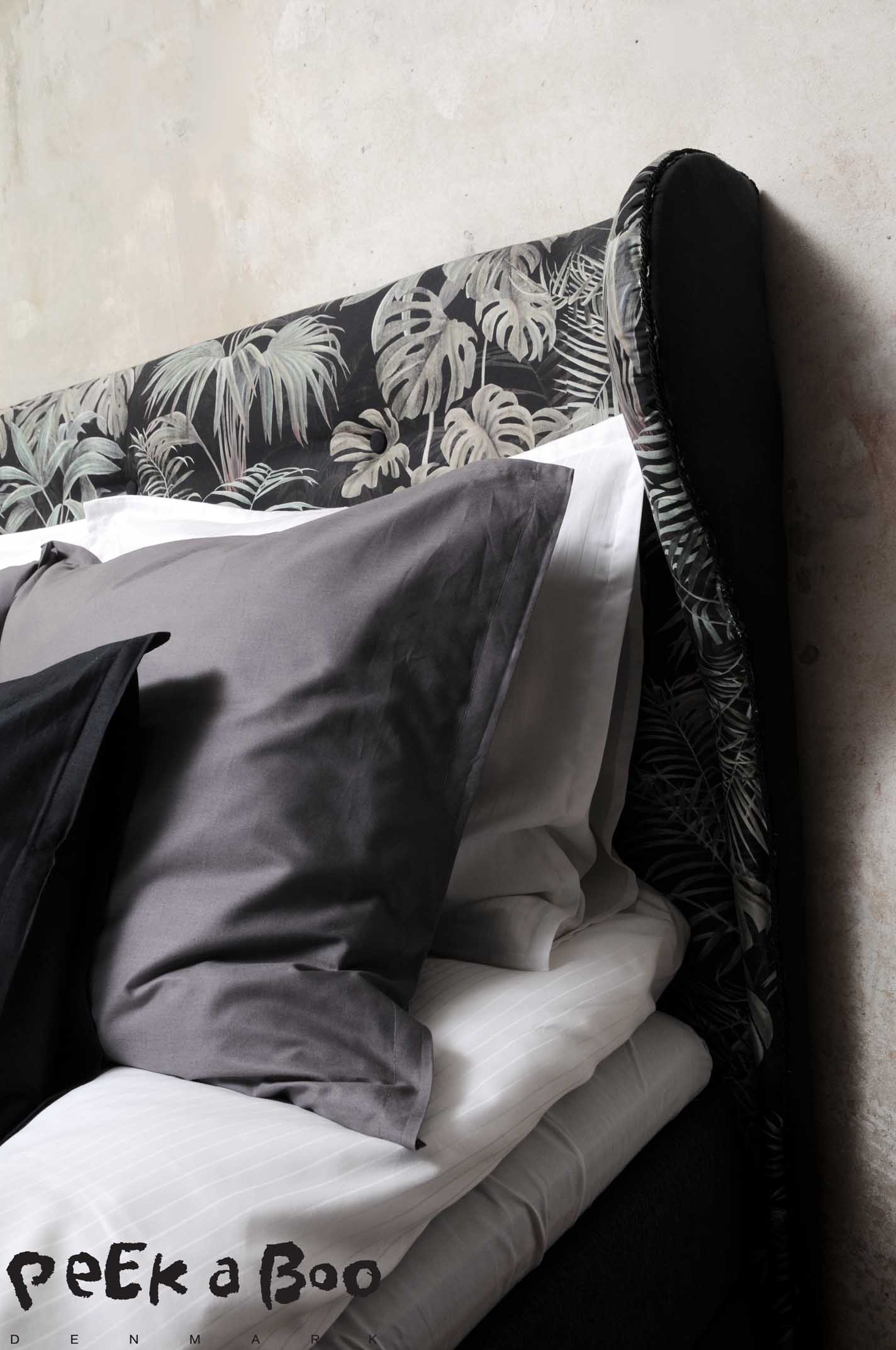 All bedlinen aer from JYSK and held in the colours white, grey and black.