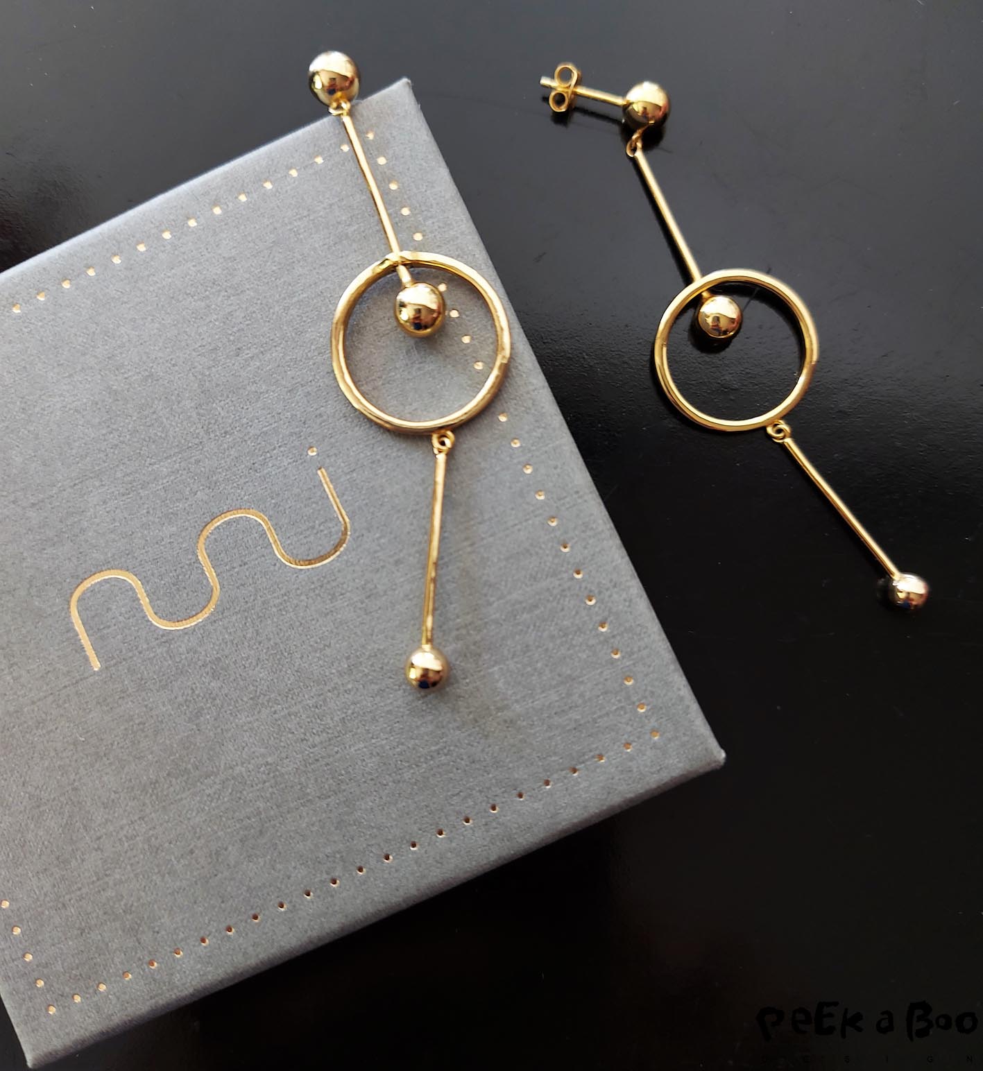 These Aisha earrings are made in 925 silver and 18 carat gold plated.