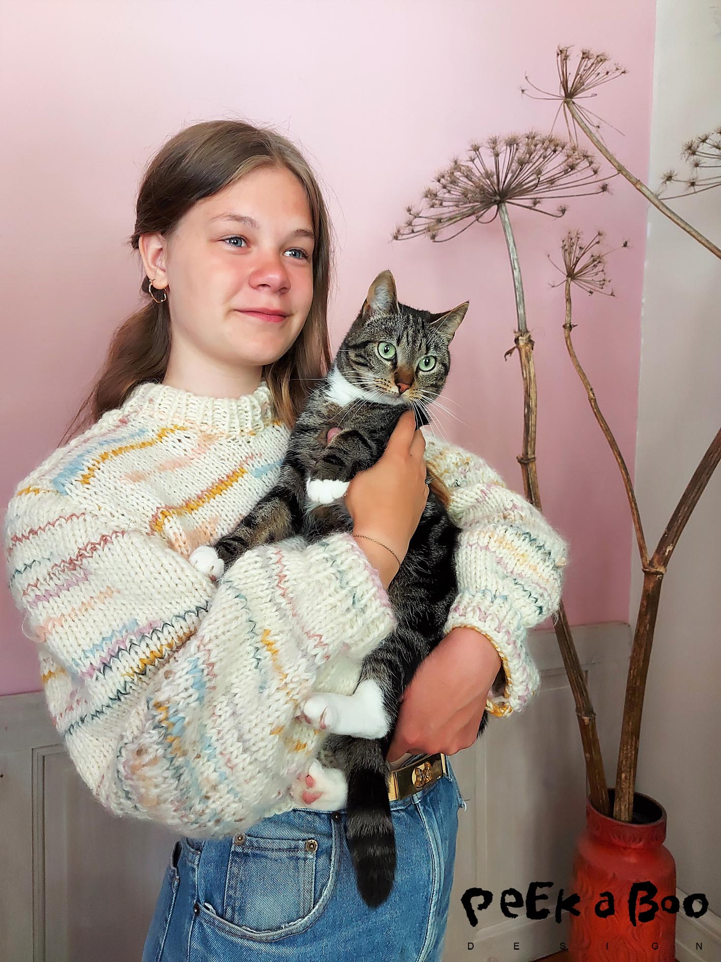 My daughter and cat...two of my favorites and even wearing the alone together sweater....what's not to like ???