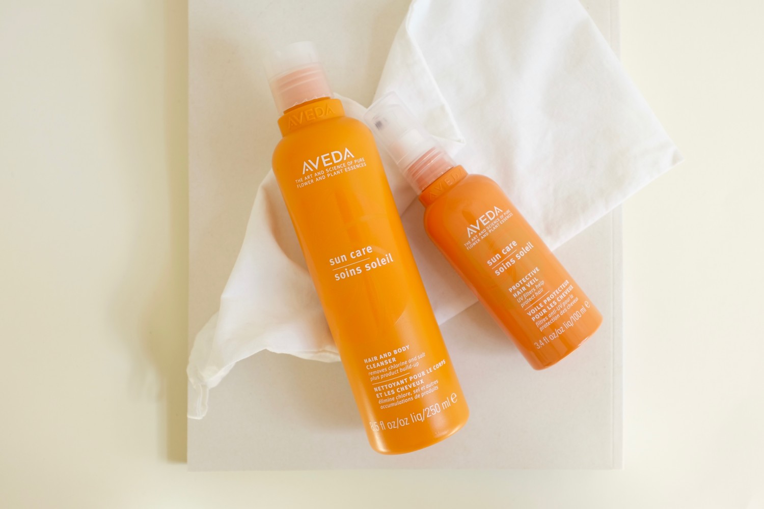 Summer-Proof Your Hair - don’t get stressed-out strands - wear a protective hair veil and treat your hair to Aveda’s after sun hair and body cleanser
