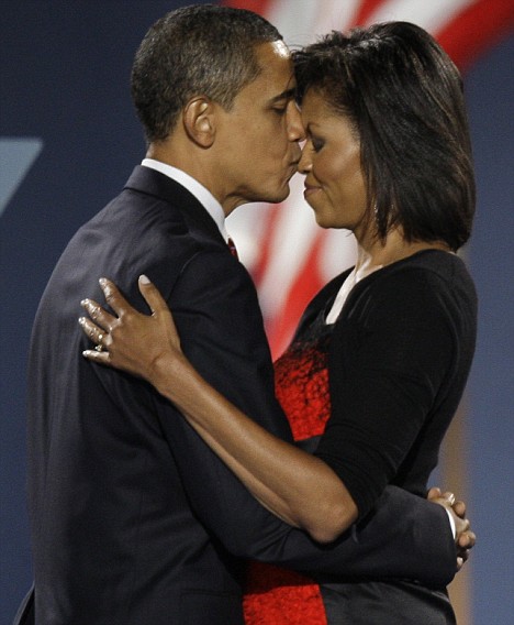 President-elect Barack Obama kisses wife, Michelle, after his acceptance speech at his election night party at Grant Park in Chicago, Tuesday night, Nov. 4, 2008. (AP Photo/Morry Gash)