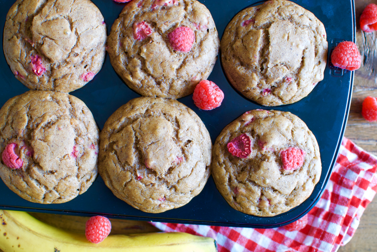 Healthified banana muffins with peanut butter and raspberries