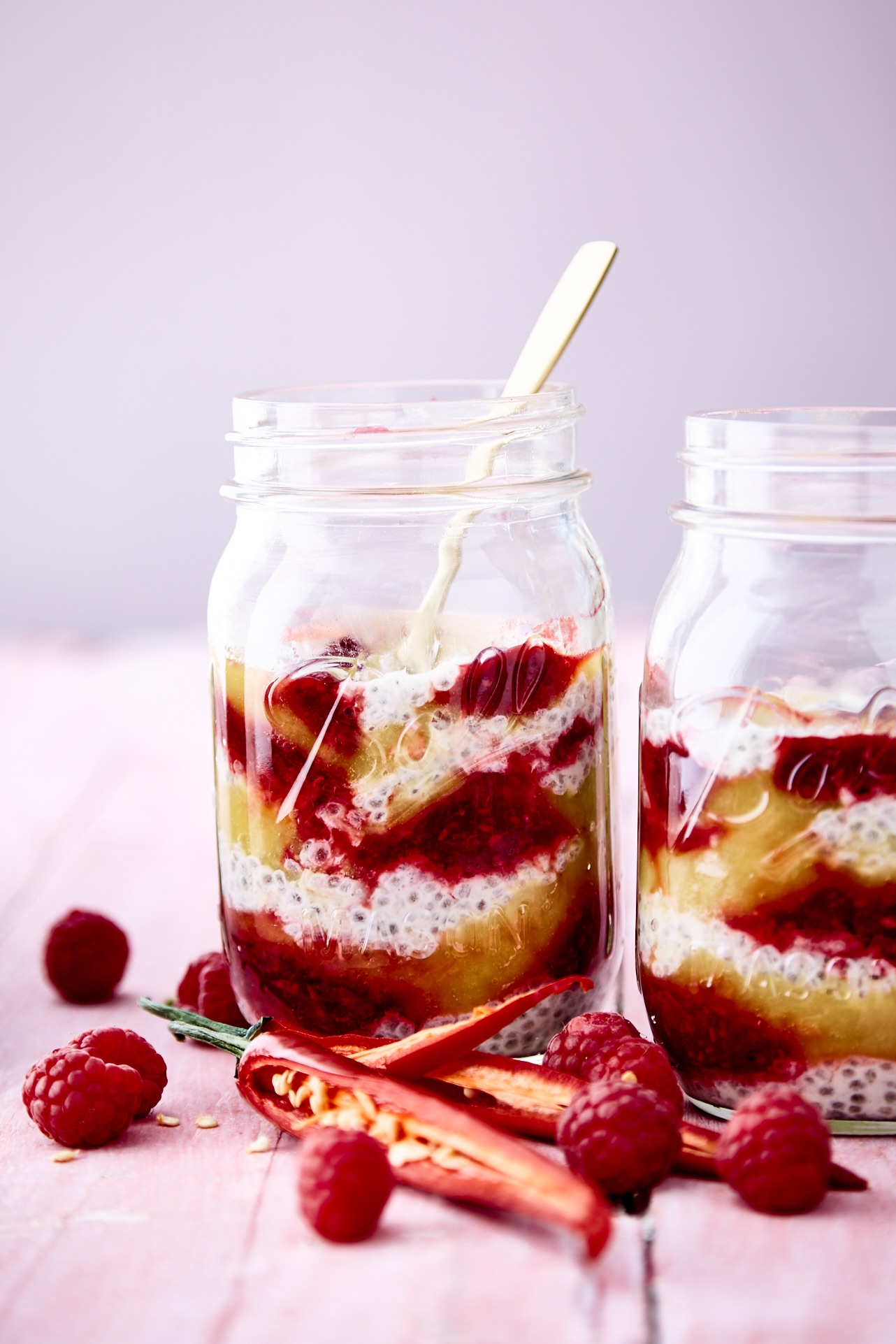 Spicy chia breakfast parfait with mango, ginger and raspberry