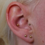 Mine huller i ørene/piercinger.